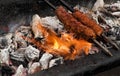 Making mutton kababs or kebabs on coal fired arrangement Royalty Free Stock Photo