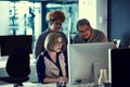 Making it a night of hard work. a group of businesspeople working late in an office. Royalty Free Stock Photo