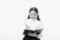 Making notes. Child school uniform kid doing homework. Child girl school uniform clothes hold book and pen. Girl cute Royalty Free Stock Photo