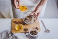 Making organic scrub handmade at home with hands Royalty Free Stock Photo