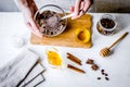 Making organic scrub handmade at home with hands Royalty Free Stock Photo