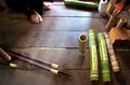 Making ornate bamboo quiver for blowpipe darts on Borneo Royalty Free Stock Photo