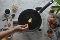 Making pancakes, cake, baking top view of baker hands pouring or scoop the batter onto the pan. Concept of Cooking ingredients and Royalty Free Stock Photo