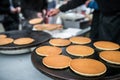 Making pancakes on a street market Royalty Free Stock Photo