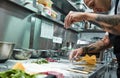 Making pasta process. Close up photo of concentrated chef with black tattoos on his arms pouring flour on kitchen table