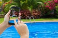 Making photo of boy jumping in pool Royalty Free Stock Photo