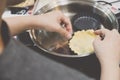 Making pie crust on frypan Royalty Free Stock Photo