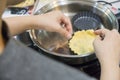 Making pie crust on frypan Royalty Free Stock Photo