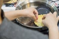 Making pie crust on frypan Royalty Free Stock Photo