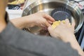 Making pie crust on frypan Royalty Free Stock Photo