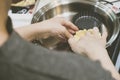 Making pie crust on frypan Royalty Free Stock Photo