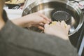 Making pie crust on frypan Royalty Free Stock Photo