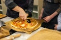 making pizza with cheese and tomatoes italian food