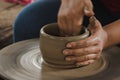 Making pottery by hand to make a container