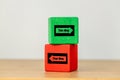 Making the right decisions, green and red wooden block with arrows in opposite directions. Text this way and that, Concept, Royalty Free Stock Photo