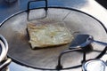 Making of roti on the pan