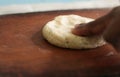 Making roti with prepared dough