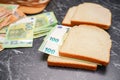 Making a sandwich from euro banknotes Royalty Free Stock Photo