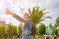 Making selfie. Pretty female taking fun self portrait photo. Happy young girl with phone smile, typing texting and taking selfie Royalty Free Stock Photo