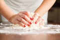 Making shortcrust pastry dough by woman's hands