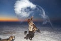 Making Snow with Boiling Water, Far North, girl splashes hot water in minus 40, selective focus