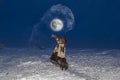 Making Snow with Boiling Water, Far North, girl splashes hot water in minus 40, selective focus