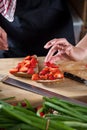 Making a strawberry sandwich Royalty Free Stock Photo