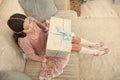 Making surprise for daughter. Small kid opening surprise gift. Delivering happiness. Christmas time. Child with Royalty Free Stock Photo