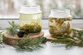 Making syrup of fresh pine needles and spruce needles.