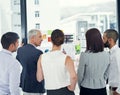 Making it their business to succeed. a group of businesspeople looking at graphs together. Royalty Free Stock Photo