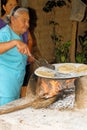 Making tortillas over a wood fire