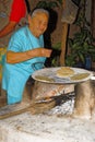 Making tortillas over a wood fire