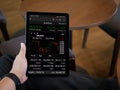 Making trading online on the smart phone. New ways to make economy and trading Royalty Free Stock Photo