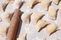 Making traditional food pierogy with dough roller Royalty Free Stock Photo