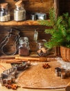 Making traditional gingerbread. Christmas. New year. Raw dough, cutting cookie and condiments on the table Royalty Free Stock Photo