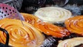 Indian street food-making of Jilebi or jalebi ,a popular sweet