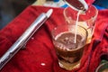 Making traditional Thai milk tea using coffee bag in Stainless Steel Pot. Old Thai tea made shop street food Royalty Free Stock Photo