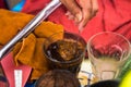 Making traditional Thai milk tea using coffee bag in Stainless Steel Pot. Old Thai tea made shop street food Royalty Free Stock Photo