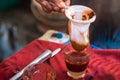 Making traditional Thai milk tea using coffee bag in Stainless Steel Pot. Old Thai tea made shop street food Royalty Free Stock Photo