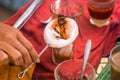 Making traditional Thai milk tea using coffee bag in Stainless Steel Pot. Old Thai tea made shop street food Royalty Free Stock Photo