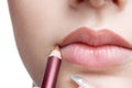 Making up lips contour Royalty Free Stock Photo