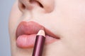 Making up lips contour Royalty Free Stock Photo