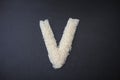 Making the V capital letter by formed rice seeds