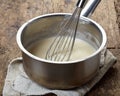 Making vanilla sauce Royalty Free Stock Photo