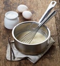 Making vanilla sauce Royalty Free Stock Photo