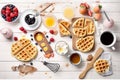 Making waffles. Top view of a kitchen table with ingredients and tools. Generative AI