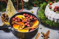 Making Warming Festive Mulled Wine with Fruits and Spices