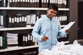 Making the world more beautiful one building at a time. a young architect designing a building model in a modern office. Royalty Free Stock Photo