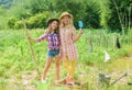 Making your life happy. children work in field use gardening tool. earth day. summer family farm. happy farming. spring Royalty Free Stock Photo
