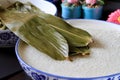 Making Zongzi, a pyramid-shaped glutinous rice dumpling Royalty Free Stock Photo